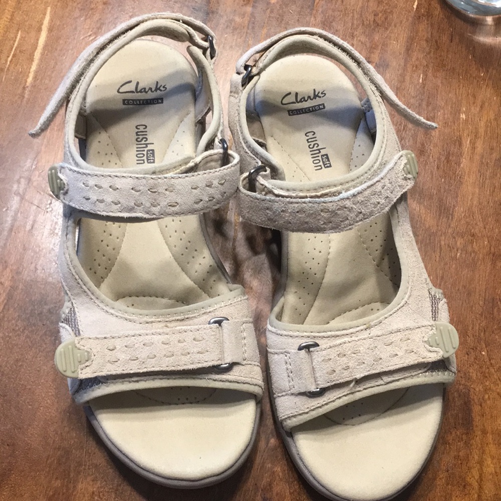 Clark’s beige suede sandal.